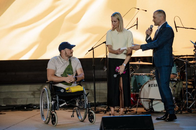 Rehabilitation award ceremony on stage recognizing achievements in Ukrainian veteran care and recovery